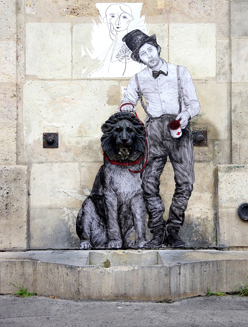 quirky_wheatpastes_by_artist_levalet_on_the_streets_of_paris_2016_05