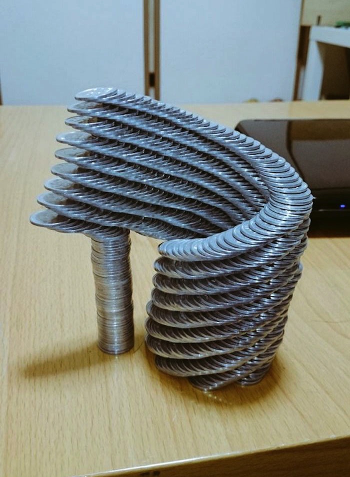 japanese_artist_tanu_is_a_master_of_stacking_coins_2016_10