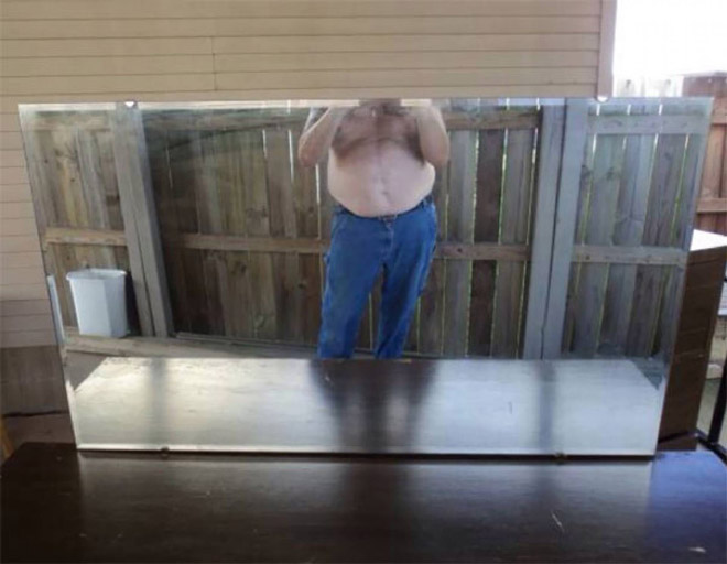 Photos of people awkwardly trying to sell their mirror